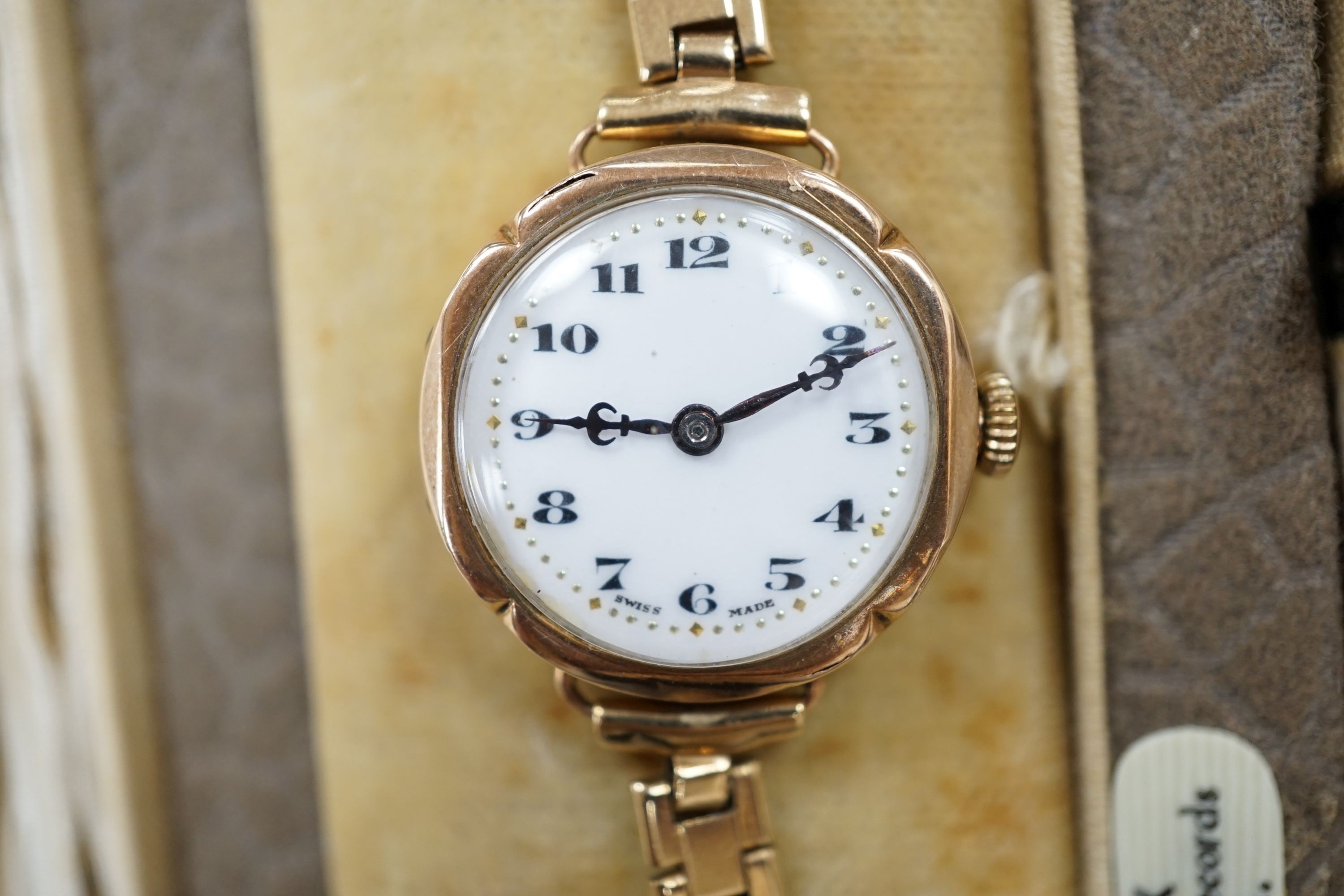 A lady's early 20th century 9ct gold Rolex manual wind wrist watch, on an associated 9ct gold bracelet